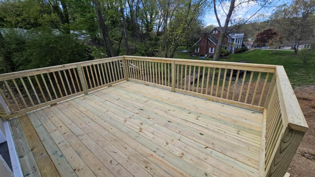 Custom wood pressure treated deck installation built in Johnson City Tennessee.